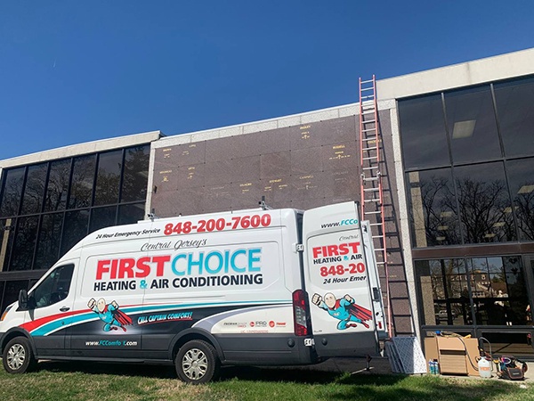 first choice can in front of office installing commercial HVAC units